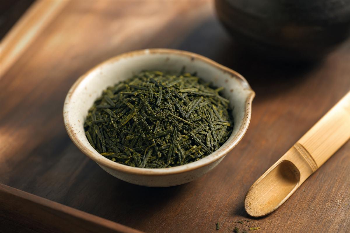 Loose tea leaves on a tray